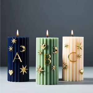 Anthropologie Monogram “T” Gold Star and Moon Candle Charms NWT